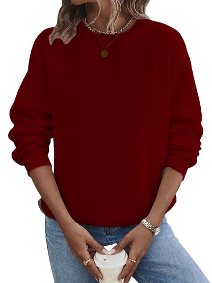 Suéter de moda de talla grande con cuello redondo en blanco y color liso