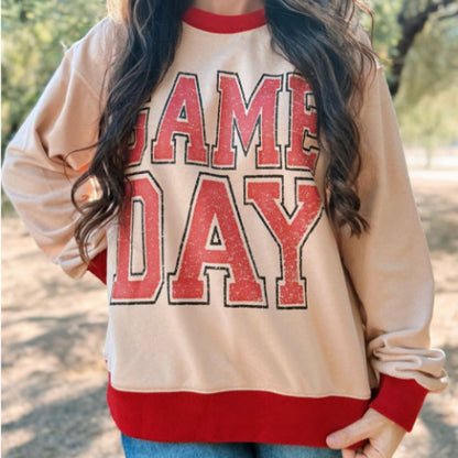 Sudadera holgada con detalle de rayas y letras y gráficos