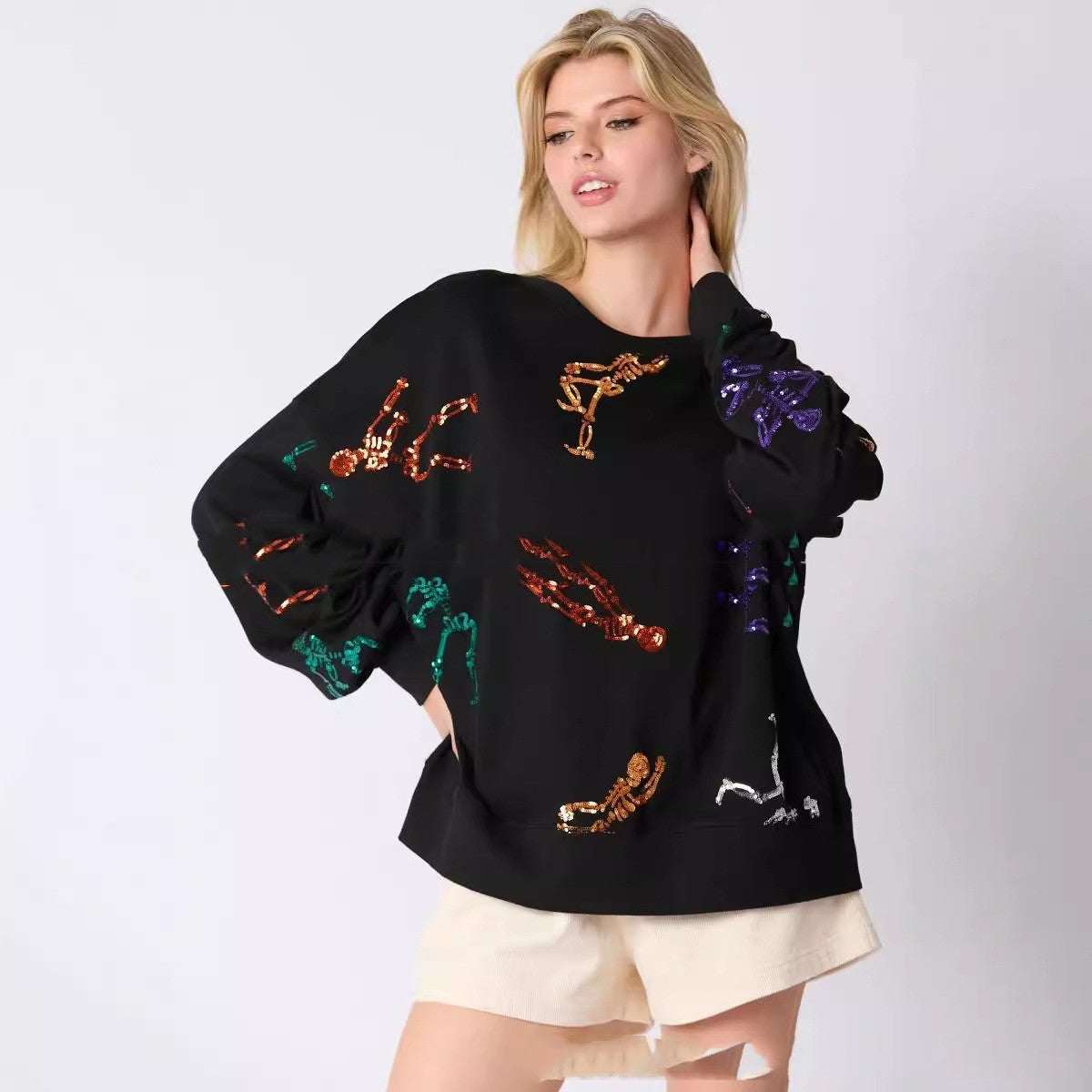 Suéter holgado con lentejuelas y calavera de Halloween para mujer