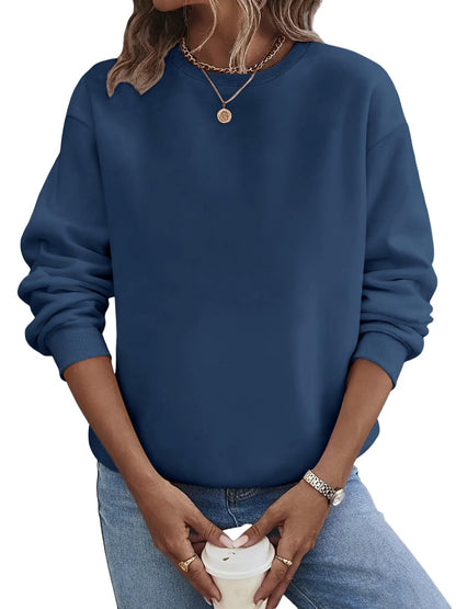 Suéter de moda de talla grande con cuello redondo en blanco y color liso